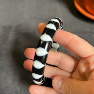 Black and white patterned lucite (?) bangle